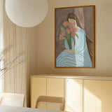 Shy Woman Pink Tulips by Nikita Jariwala — framed art print in interior | Decollective