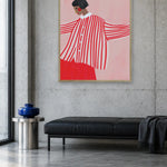 Confident Woman In Stripes by Bea Müller — framed art in interior setting 4