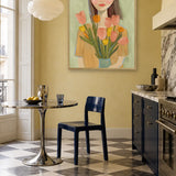 Woman with Spring Tulips by Dirkie Nell — framed art in interior setting 3