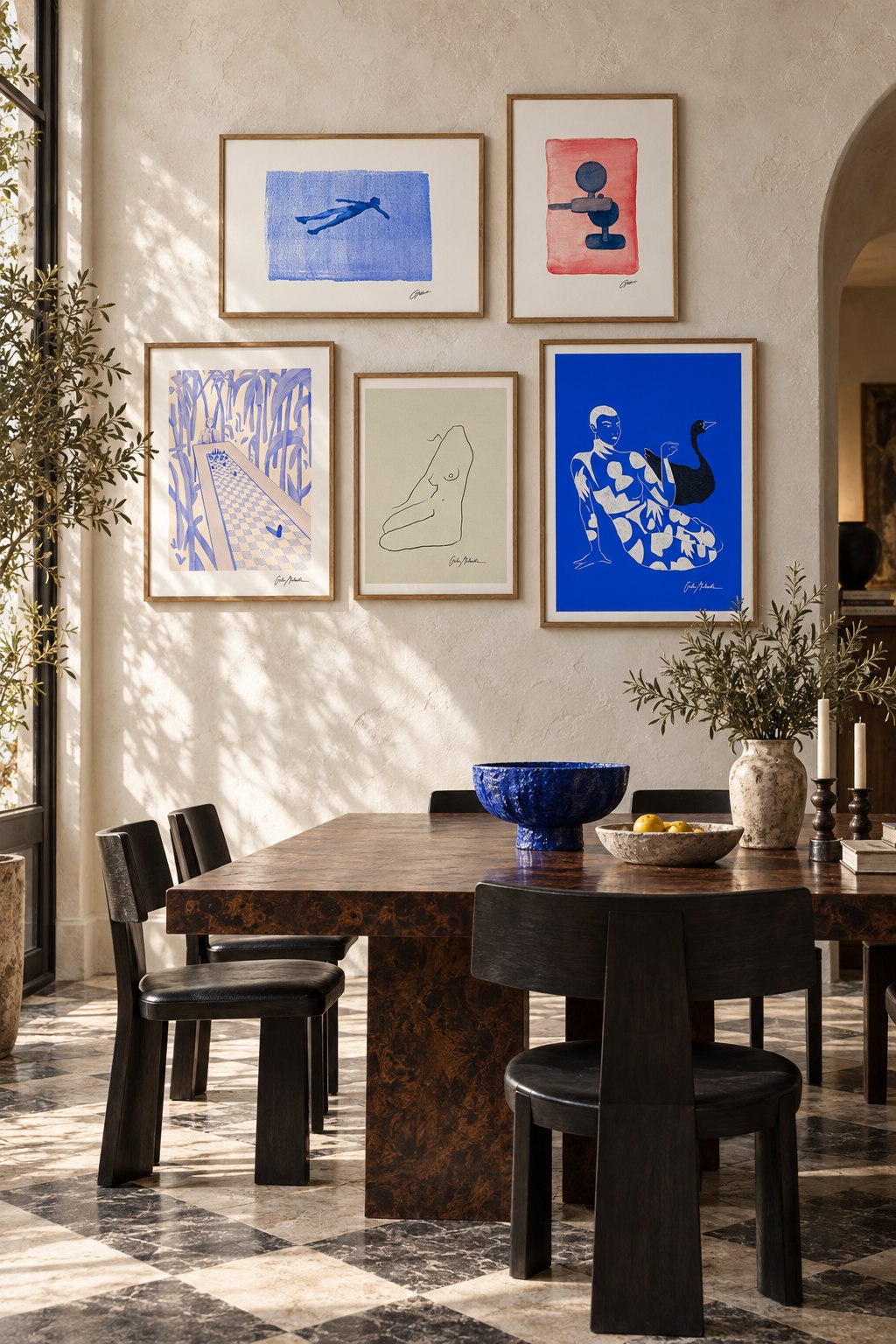 Five framed works by Gabriella Milewski in a dining room