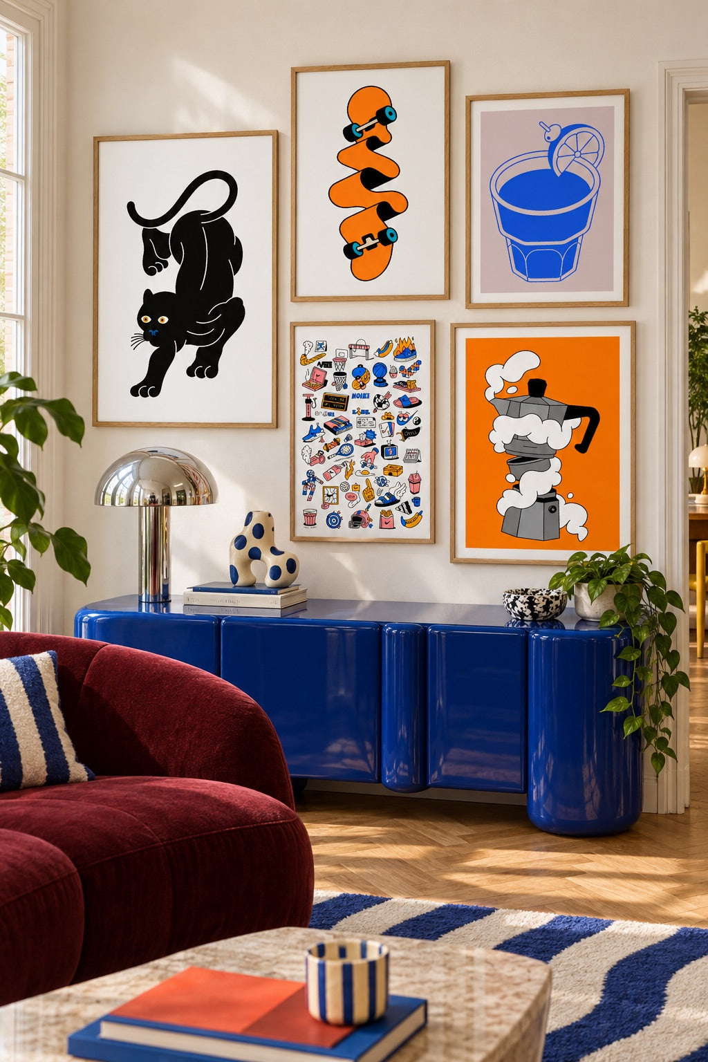 Five playful Egg Doodle prints above a blue cabinet